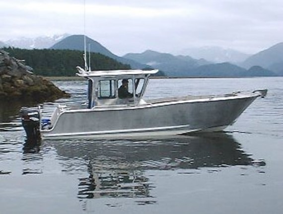 ... Flush Deck Orca has a modified sheer line and full self-bailing deck